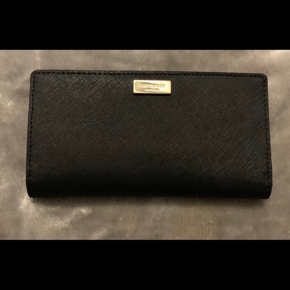 kate spade Handbags - Kate Spade large slim bifold wallet